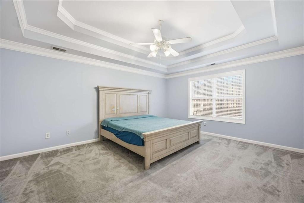 44 Creekside Way Hiram, GA 30141 - Photo 22 of 31 a room with a bed and window