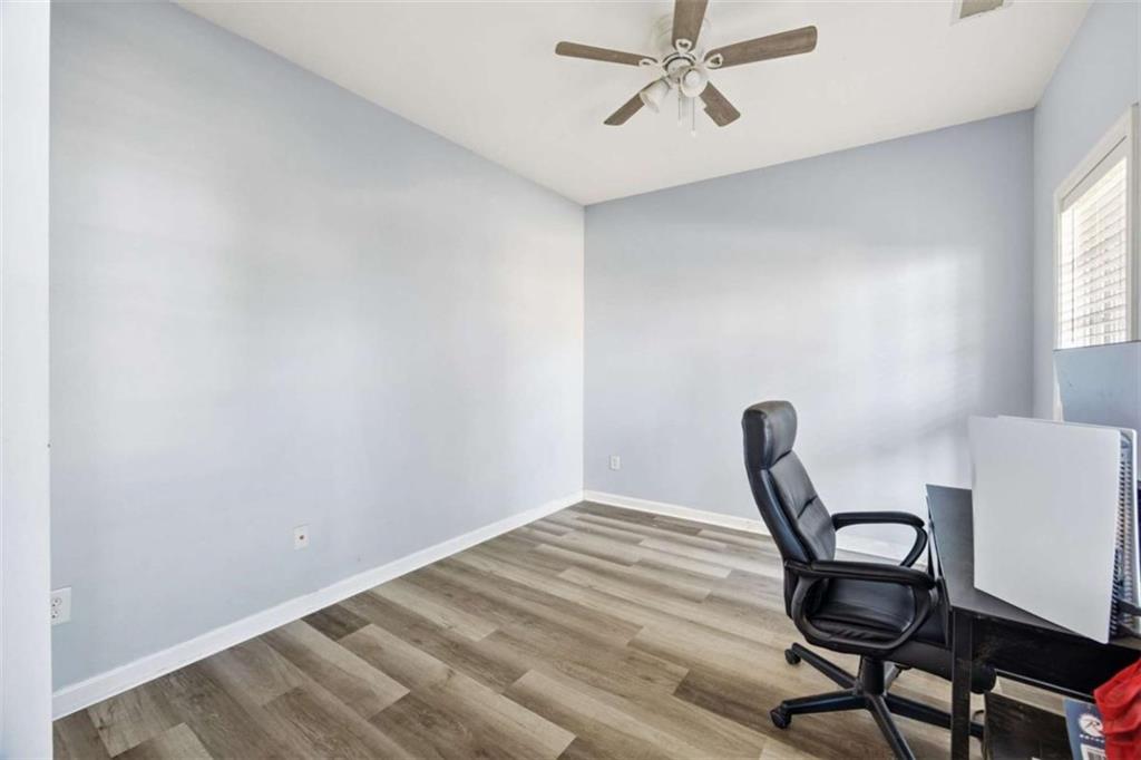 44 Creekside Way Hiram, GA 30141 - Photo 7 of 31 a view of a workspace with furniture and a window