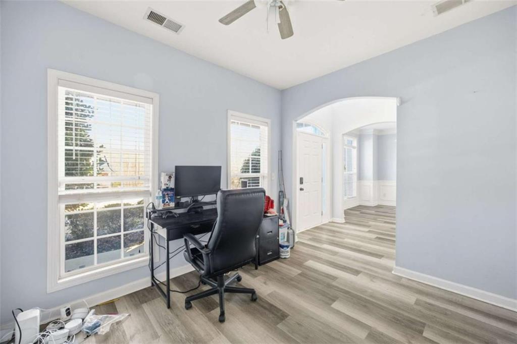 44 Creekside Way Hiram, GA 30141 - Photo 8 of 31 a view of a workspace with furniture and a window