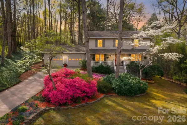 a front view of a house with yard