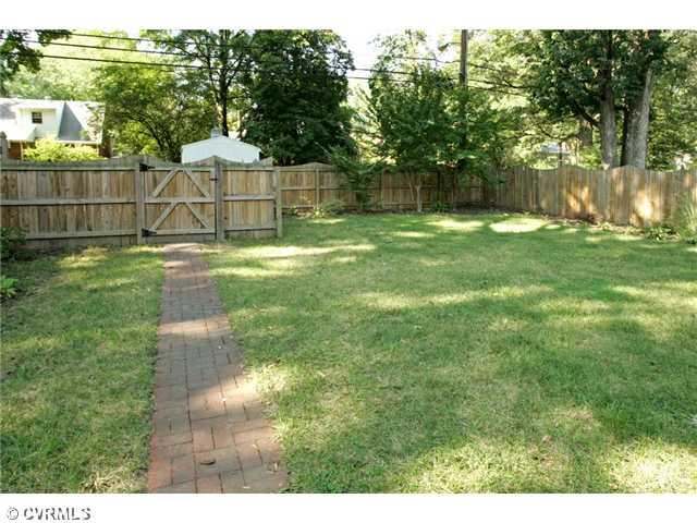 5116 Sylvan Road Richmond, VA 23225 - Photo 12 of 12 Yard/Garden - Fully fenced, flat BACKYARD with plenty of space for gardening, play, or projects. There are 2 off-street parking spaces off the alley.