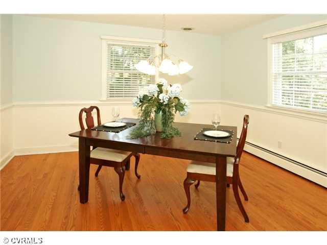 5116 Sylvan Road Richmond, VA 23225 - Photo 3 of 12 Dining Room - DINING ROOM, located just off kitchen and living room, with hardwood floors, chair rail and beautiful chandelier.
