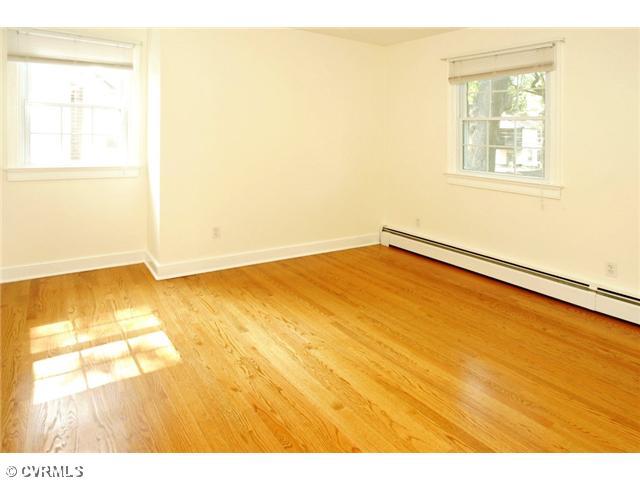 5116 Sylvan Road Richmond, VA 23225 - Photo 9 of 12 Bedroom - One of two addtional BEDROOMS off of the large second floor landing. You will be pleasantly surprised by the unexpectedly large closets and bright hardwood floors!