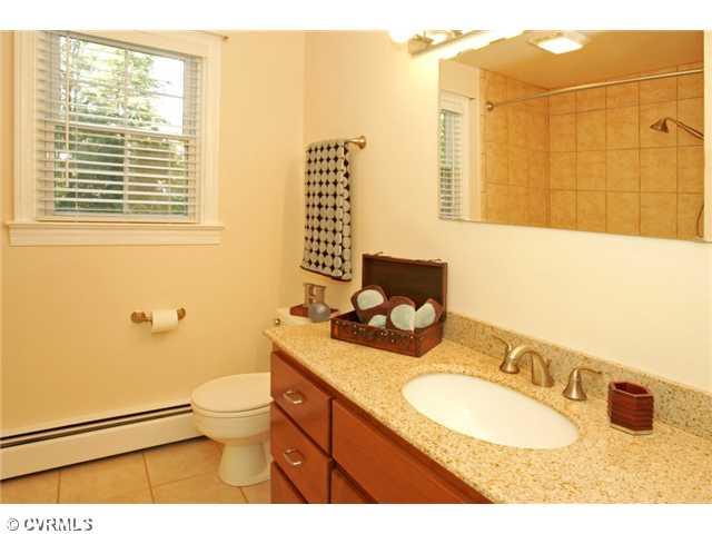 5116 Sylvan Road Richmond, VA 23225 - Photo 10 of 12 Other - Updated HALL BATH with ceramic tiled tub/shower combo and large vanity.