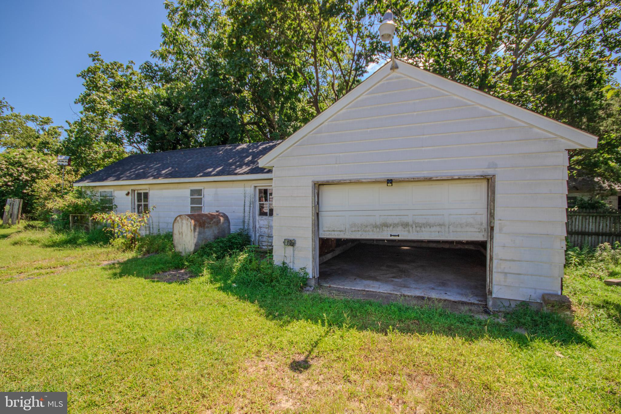605 4th Street Sharptown, MD 21861 - Photo 29 of 38 a view of a house with backyard and garden