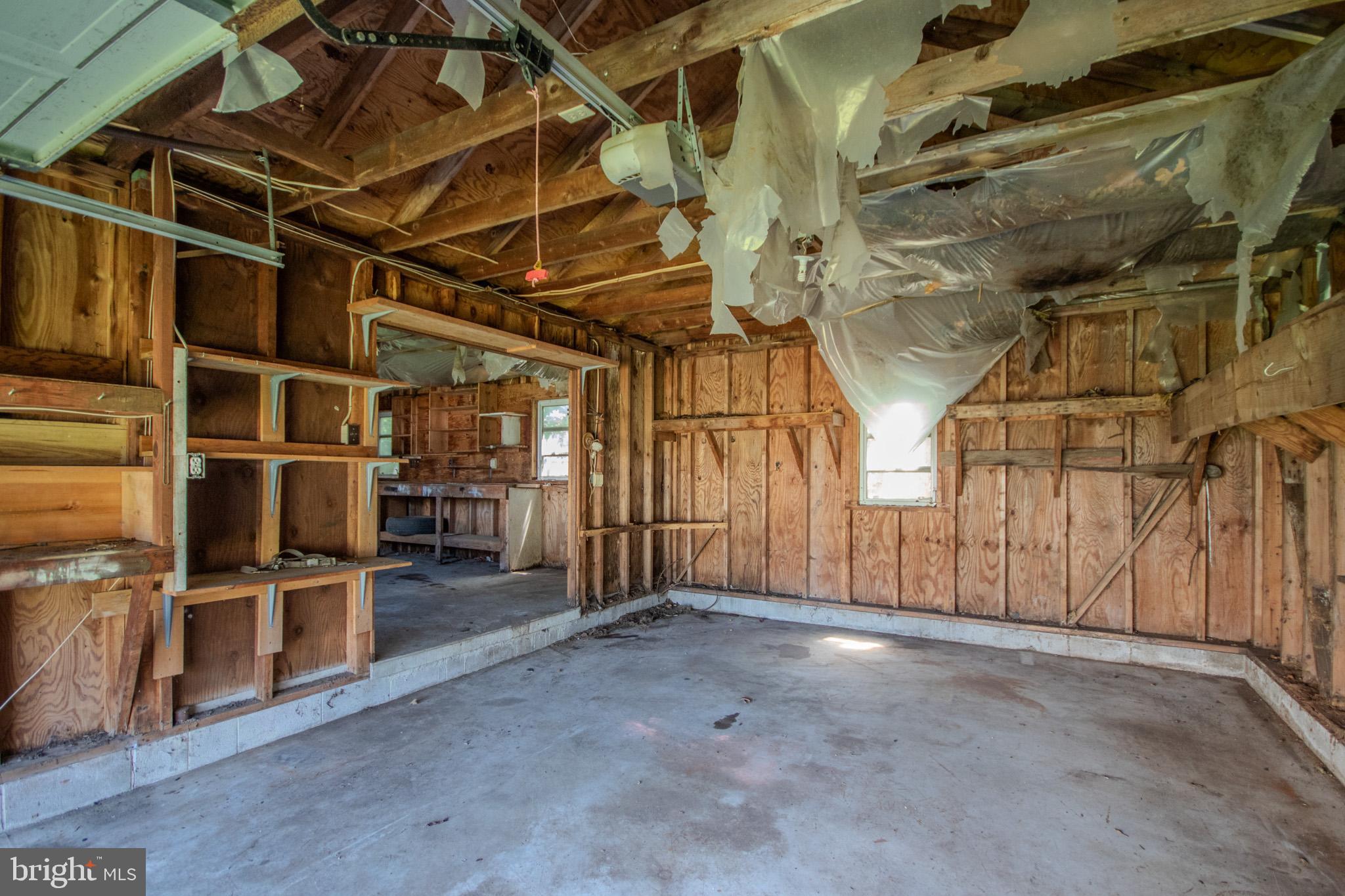 605 4th Street Sharptown, MD 21861 - Photo 30 of 38 a view of an empty room with wooden walls