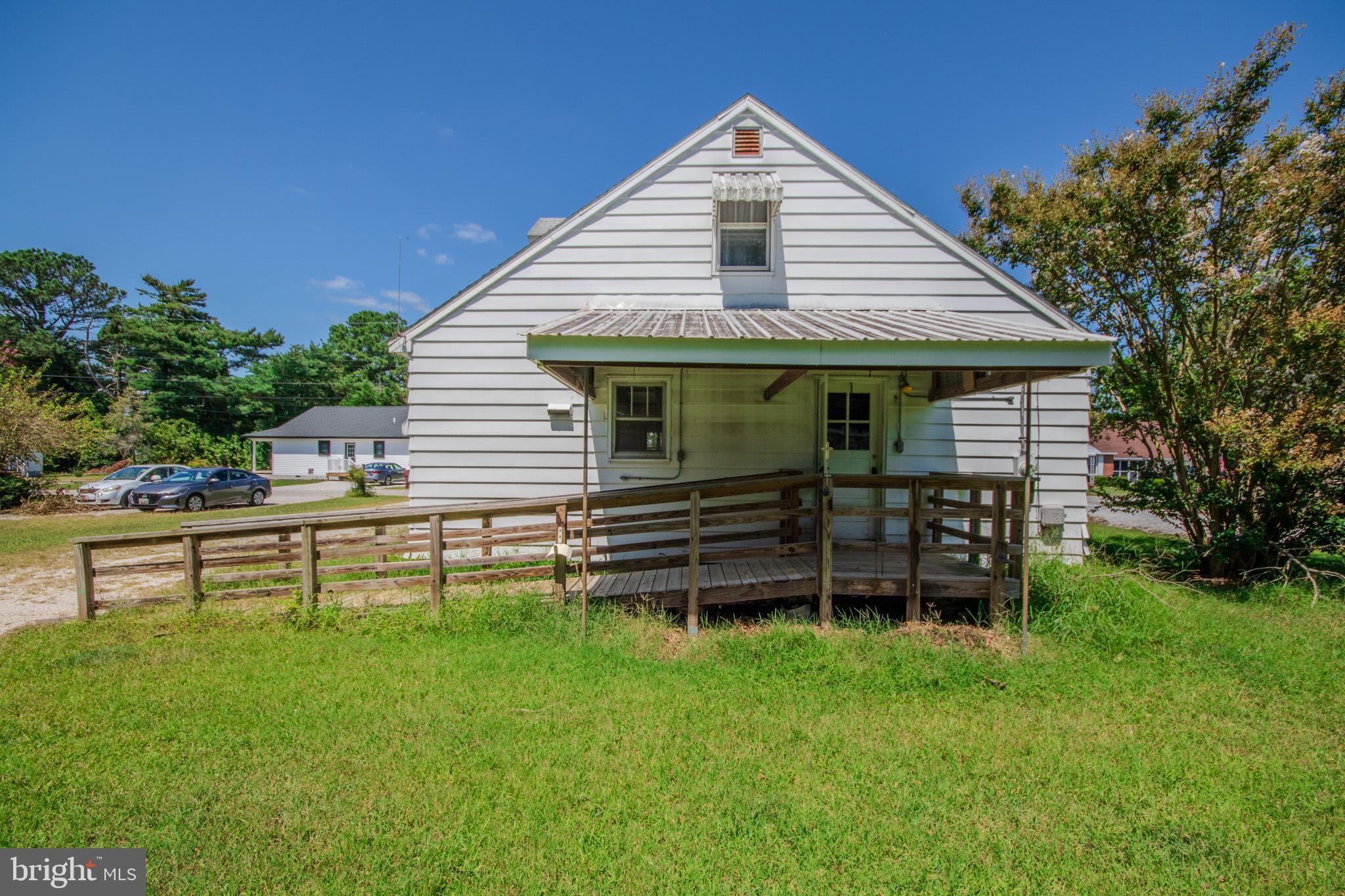 605 4th Street Sharptown, MD 21861 - Photo 35 of 38 a front view of a house with a yard