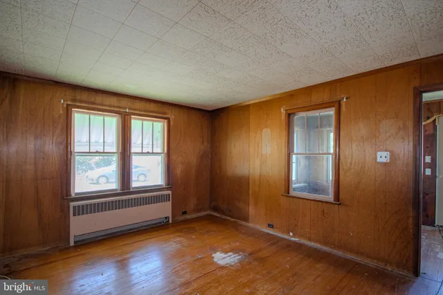 an empty room with windows