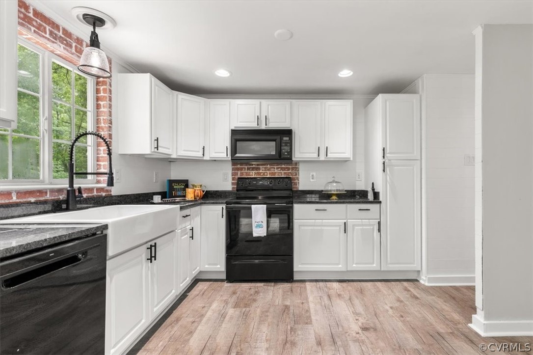 10501 White Rabbit Road Richmond, VA 23235 - Photo 11 of 49 a kitchen with granite countertop a refrigerator stove top oven and sink