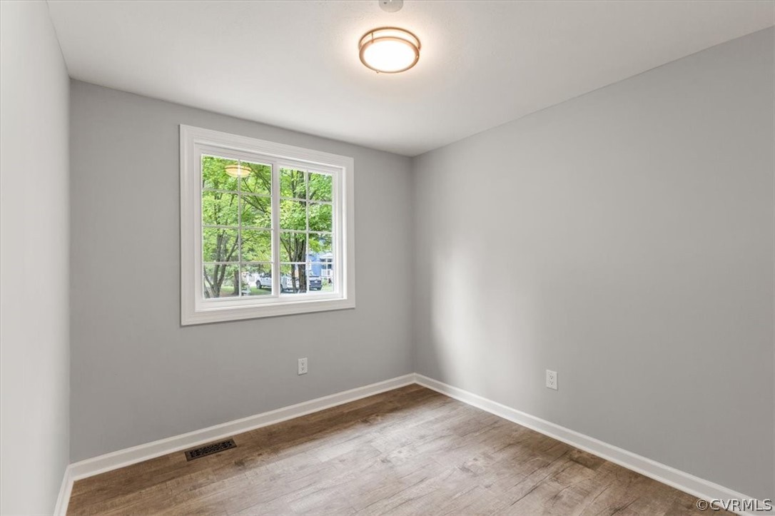 10501 White Rabbit Road Richmond, VA 23235 - Photo 17 of 49 an empty room with a window
