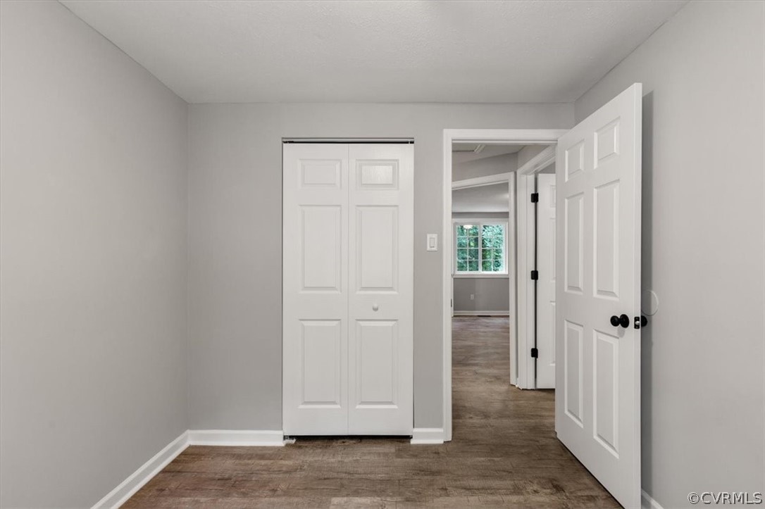 10501 White Rabbit Road Richmond, VA 23235 - Photo 18 of 49 an empty room with windows