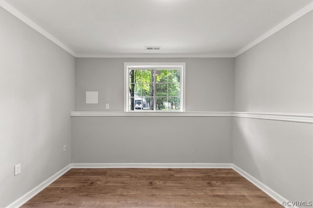 10501 White Rabbit Road Richmond, VA 23235 - Photo 42 of 49 a view of a small space with wooden floor and a window