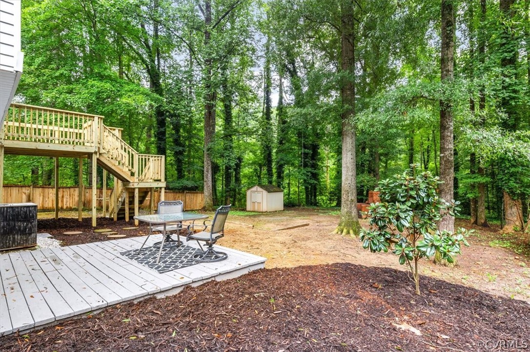 10501 White Rabbit Road Richmond, VA 23235 - Photo 46 of 49 a view of a backyard with a patio
