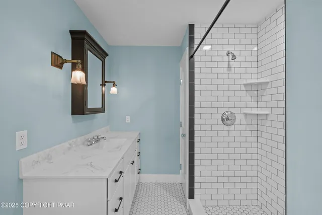 a bathroom with a sink and a bathtub