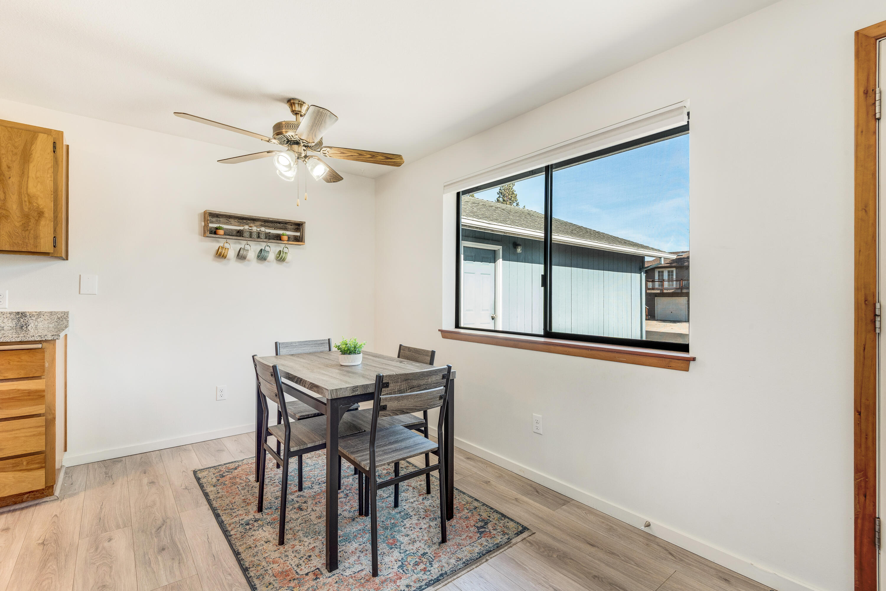 1916 Northeast Wichita Way Bend, OR 97701 - Photo 25 of 38 a view of a dining room with furniture and a window