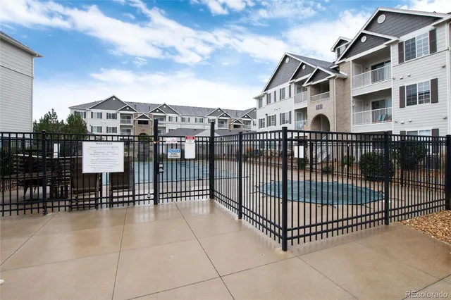 front view of a house with a garden