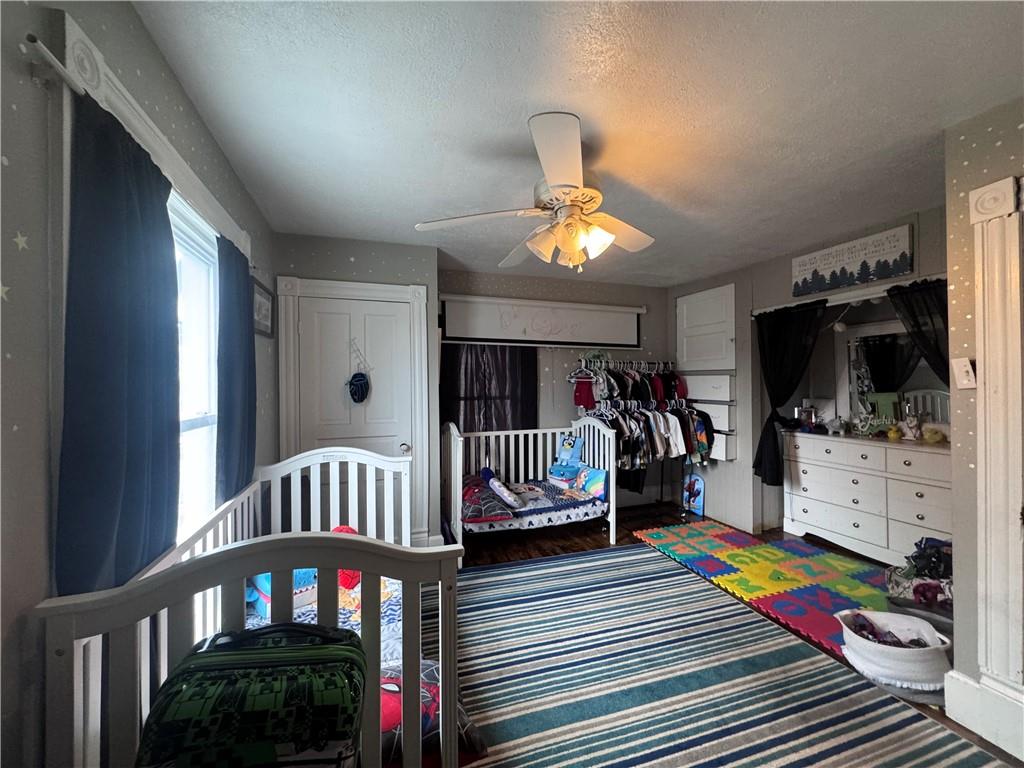 1409 Cambria Avenue Windber, PA 15963 - Photo 12 of 19 a bedroom with furniture and a flat screen tv