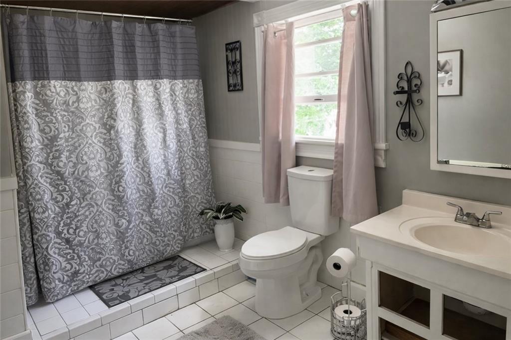 1409 Cambria Avenue Windber, PA 15963 - Photo 15 of 19 a bathroom with a sink toilet and shower