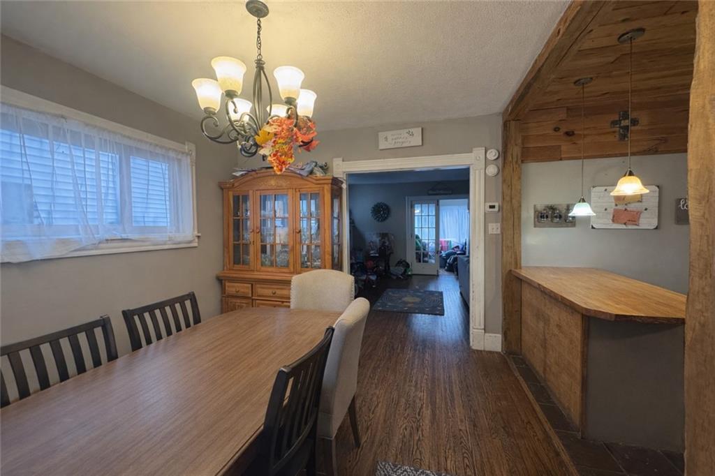 1409 Cambria Avenue Windber, PA 15963 - Photo 6 of 19 a view of a dining room with furniture window and wooden floor