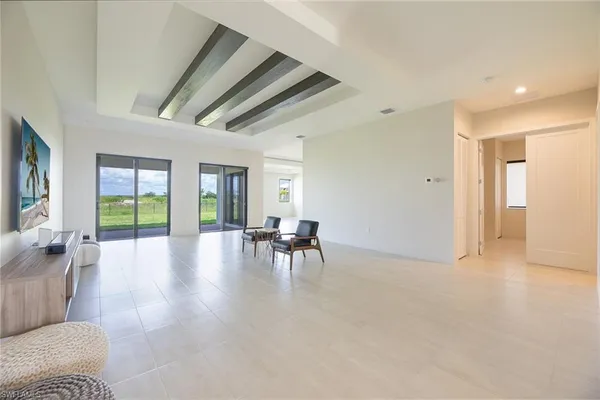 a view of livingroom with furniture and floor to ceiling window