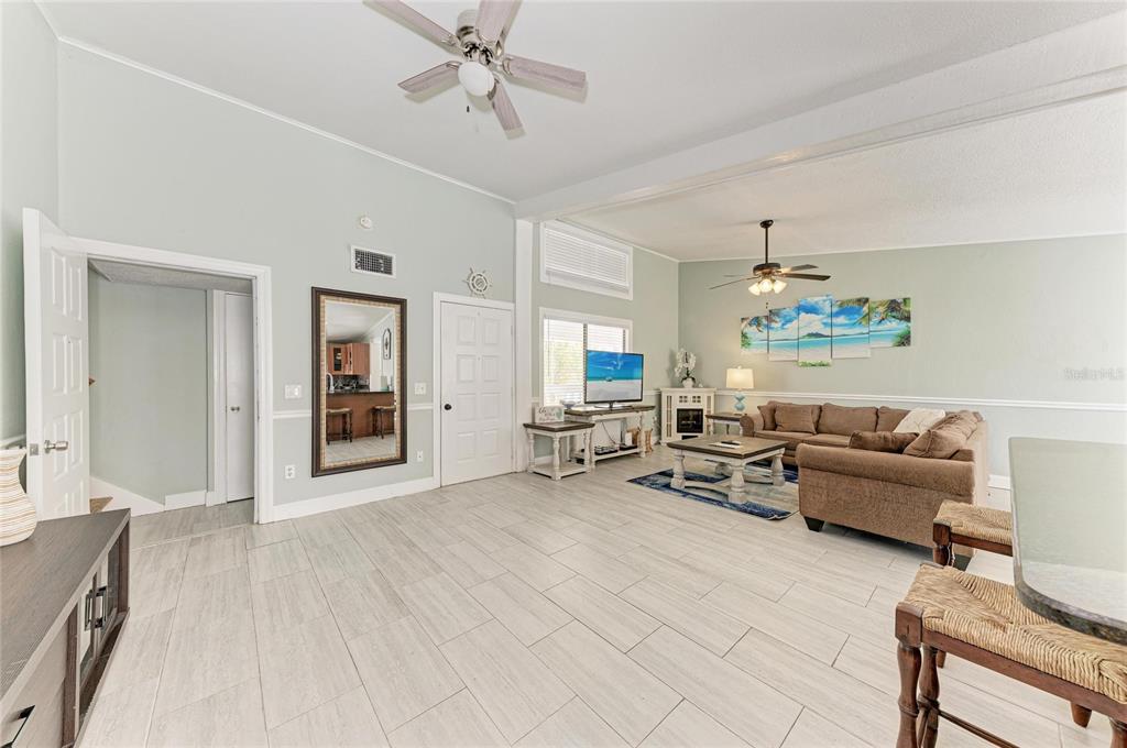 1581 Royal Road Venice, FL 34293 - Photo 13 of 41 a living room with furniture and wooden floor