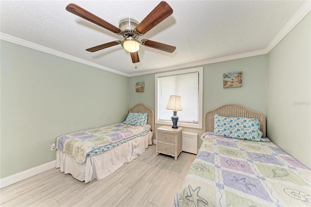 1581 Royal Road Venice, FL 34293 - Photo 28 of 41 a bedroom with a bed and window