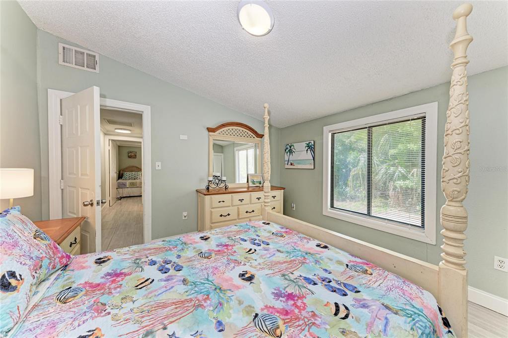 1581 Royal Road Venice, FL 34293 - Photo 31 of 41 a bedroom with a bed and a window