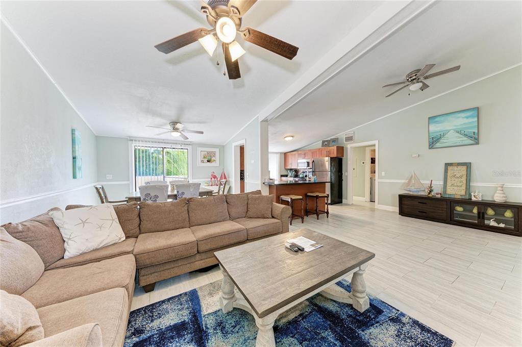1581 Royal Road Venice, FL 34293 - Photo 10 of 41 a living room with furniture and a wooden floor