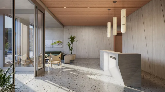 a kitchen with a sink cabinets and wooden floor