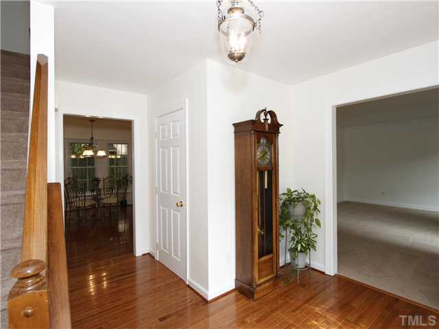 4301 Hickory Ridge Drive Raleigh, NC 27609 - Photo 2 of 25 Brand new hardwood floors greet you upon entering this delightful home. Foyer
