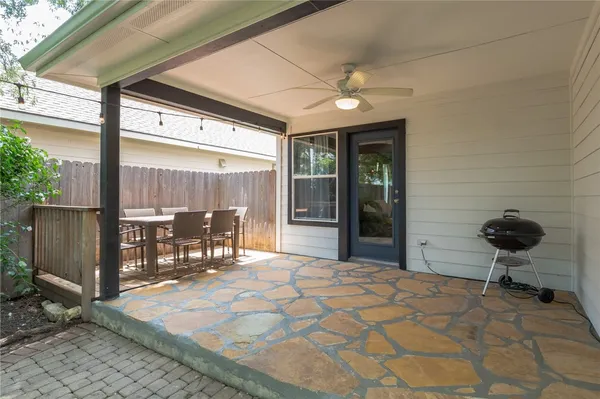 a view of a chairs in a patio