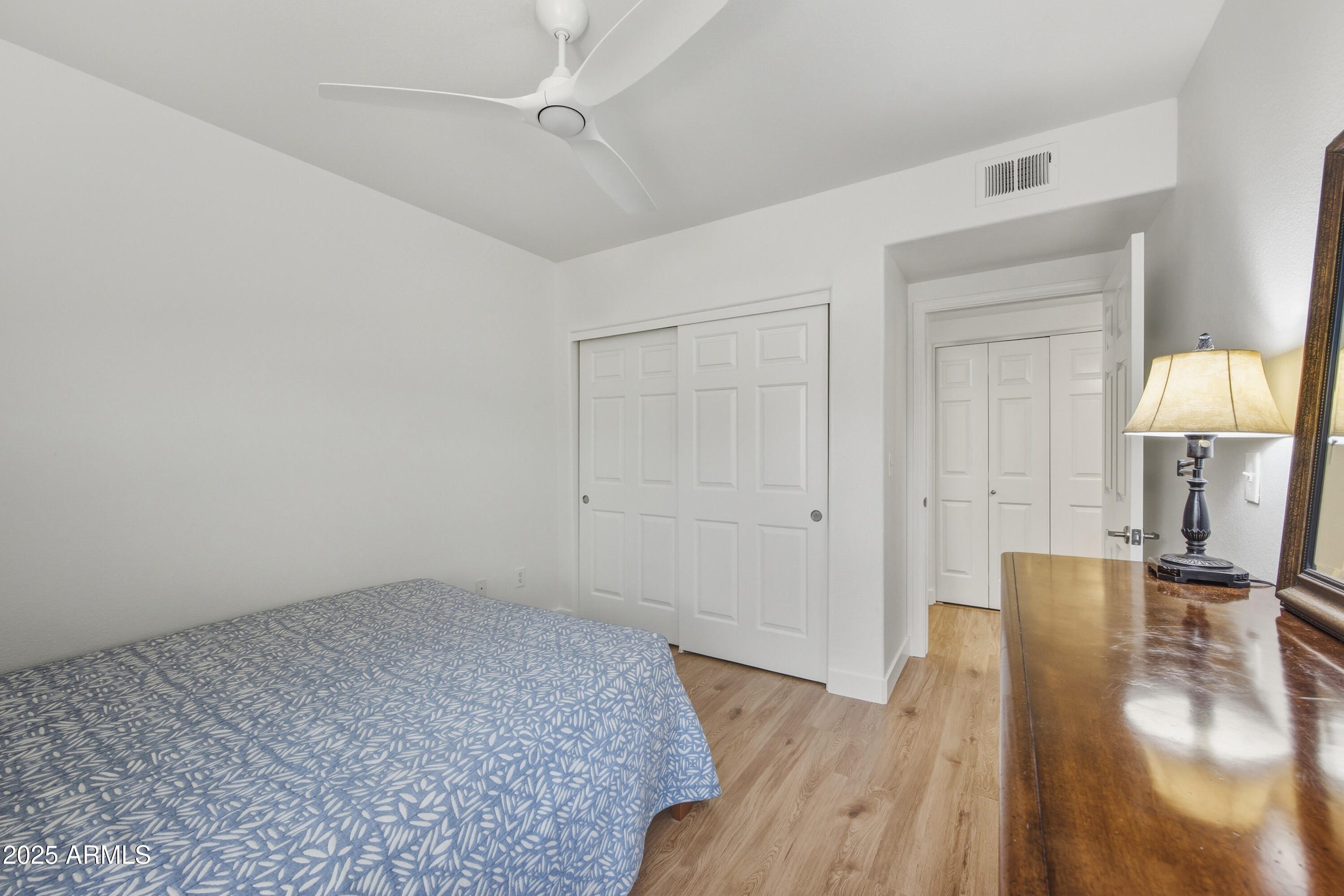 7575 East Indian Bend Road, Unit 1126 Scottsdale, AZ 85250 - Photo 19 of 33 a view of livingroom with hardwood floor and hallway