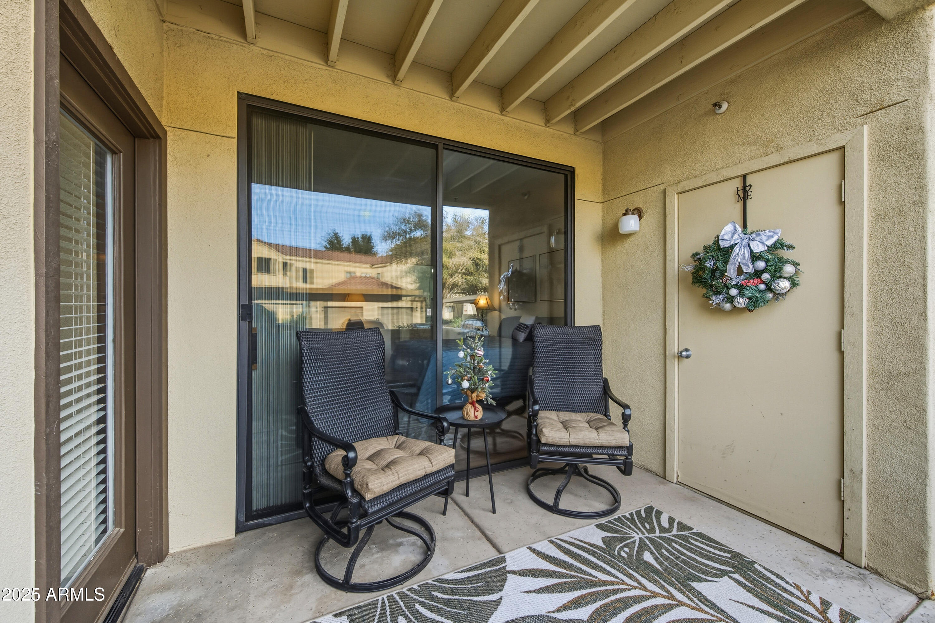 7575 East Indian Bend Road, Unit 1126 Scottsdale, AZ 85250 - Photo 24 of 33 a room with furniture and wooden floor