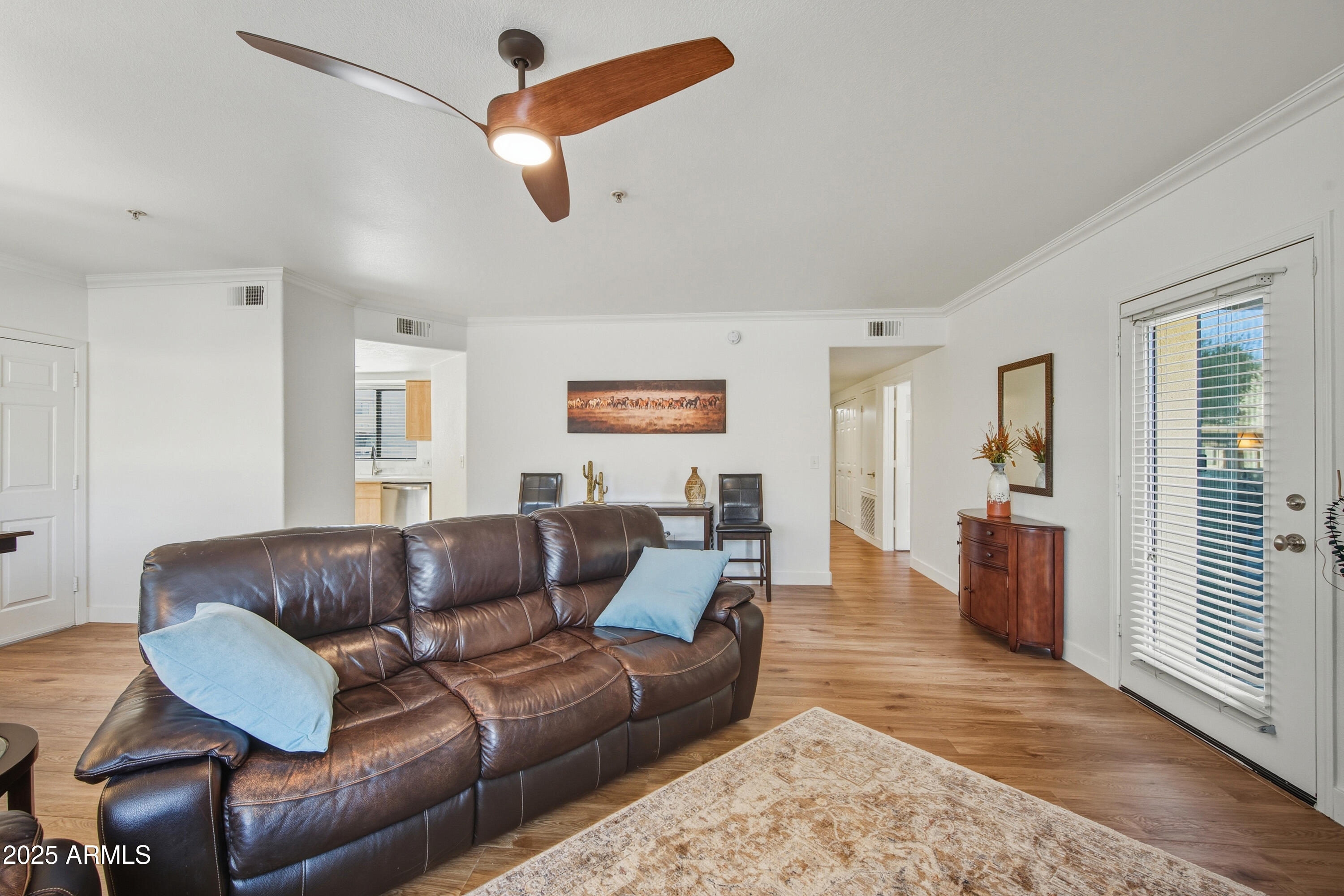 7575 East Indian Bend Road, Unit 1126 Scottsdale, AZ 85250 - Photo 6 of 33 a living room with furniture and a window
