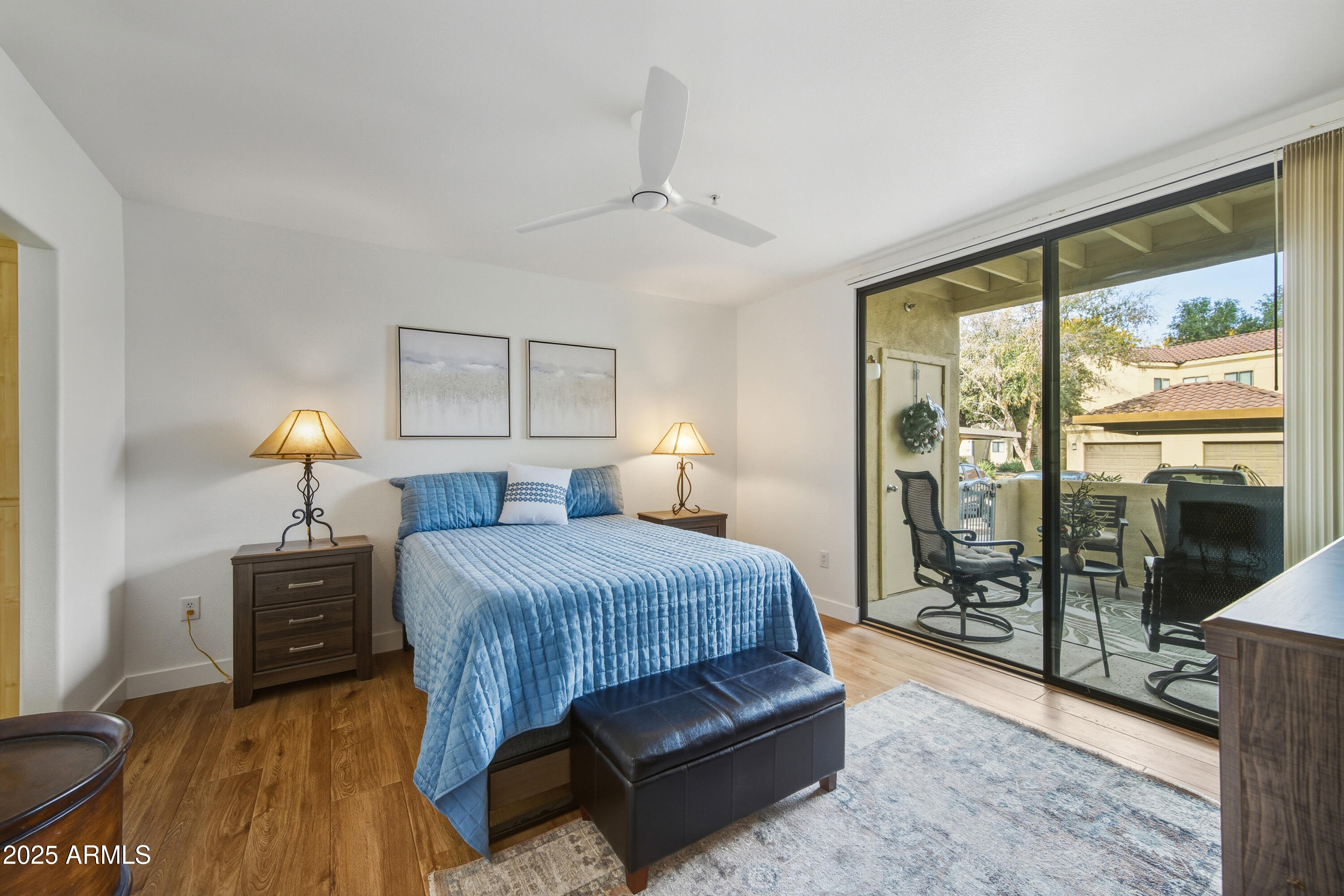 7575 East Indian Bend Road, Unit 1126 Scottsdale, AZ 85250 - Photo 10 of 33 a bedroom with a bed and large window