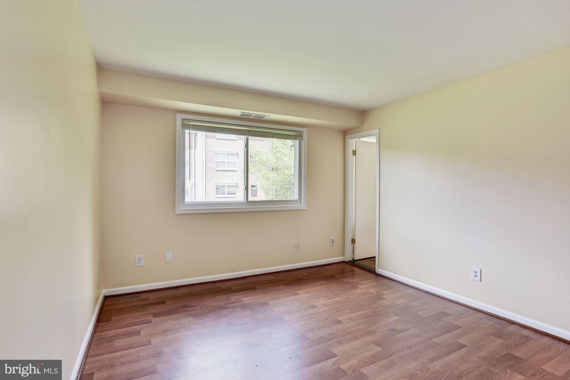 12009 Tarragon Road, Unit F Reisterstown, MD 21136 - Photo 11 of 22 an empty room with a window