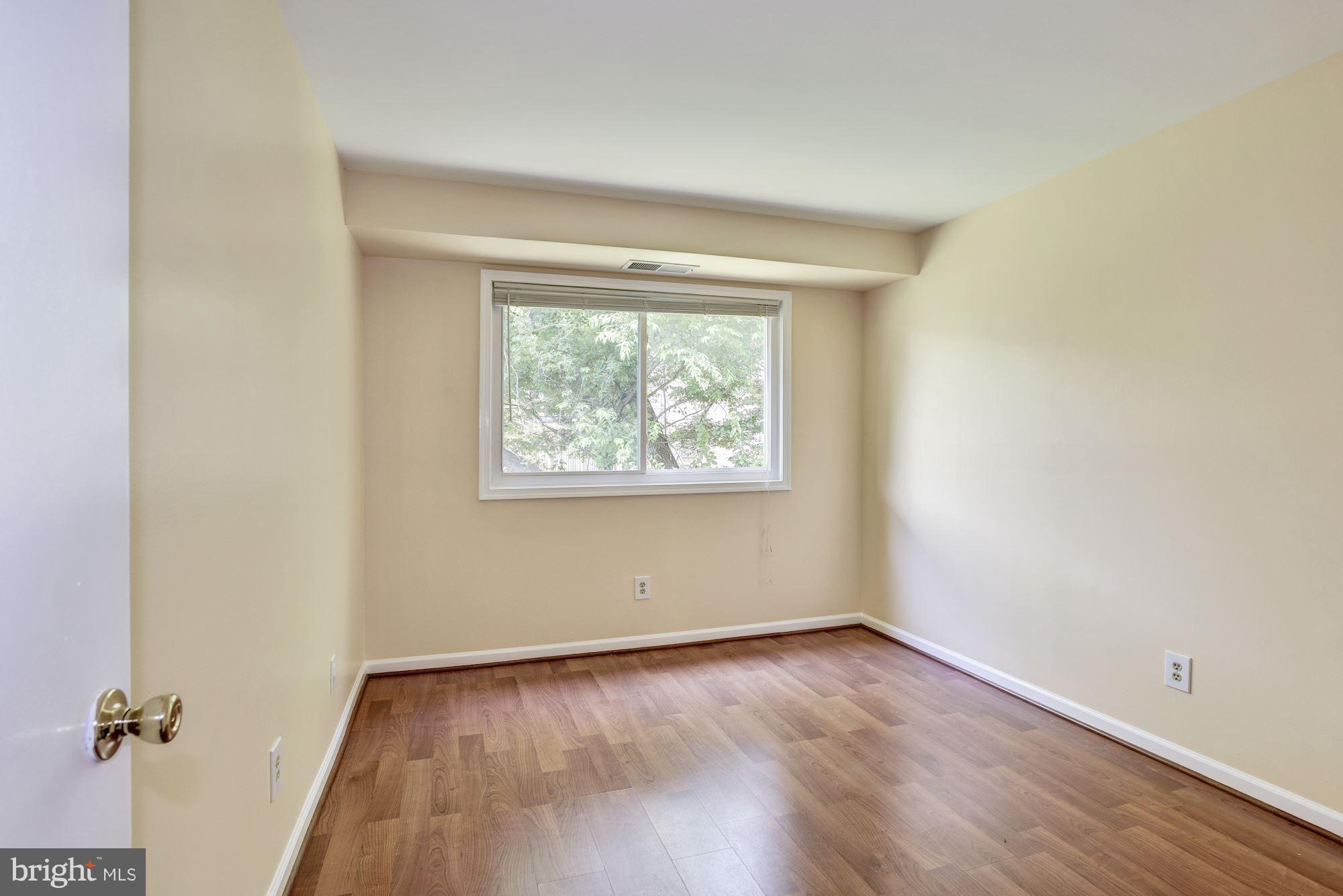 12009 Tarragon Road, Unit F Reisterstown, MD 21136 - Photo 16 of 22 an empty room with a window