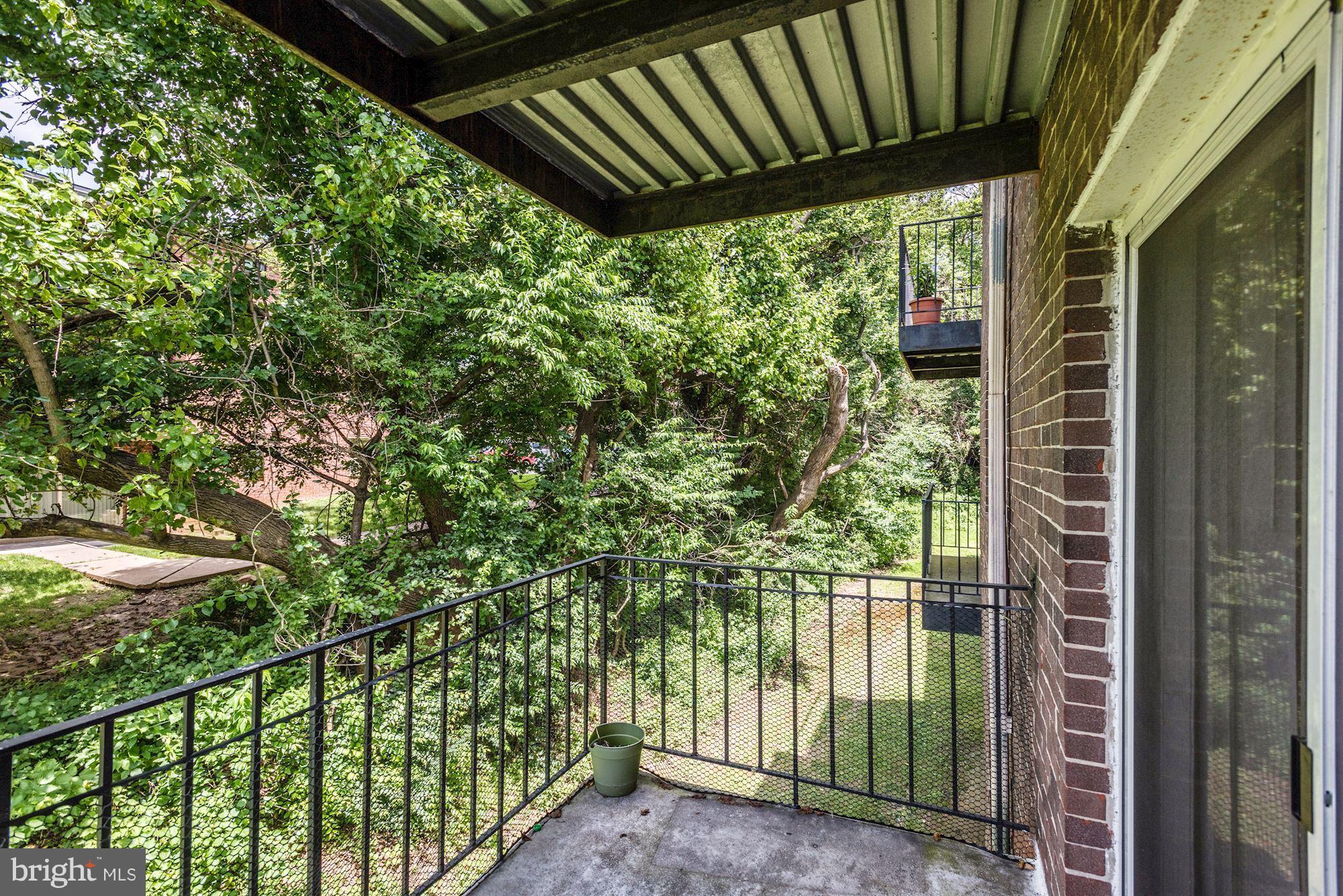 12009 Tarragon Road, Unit F Reisterstown, MD 21136 - Photo 19 of 22 a view of a backyard
