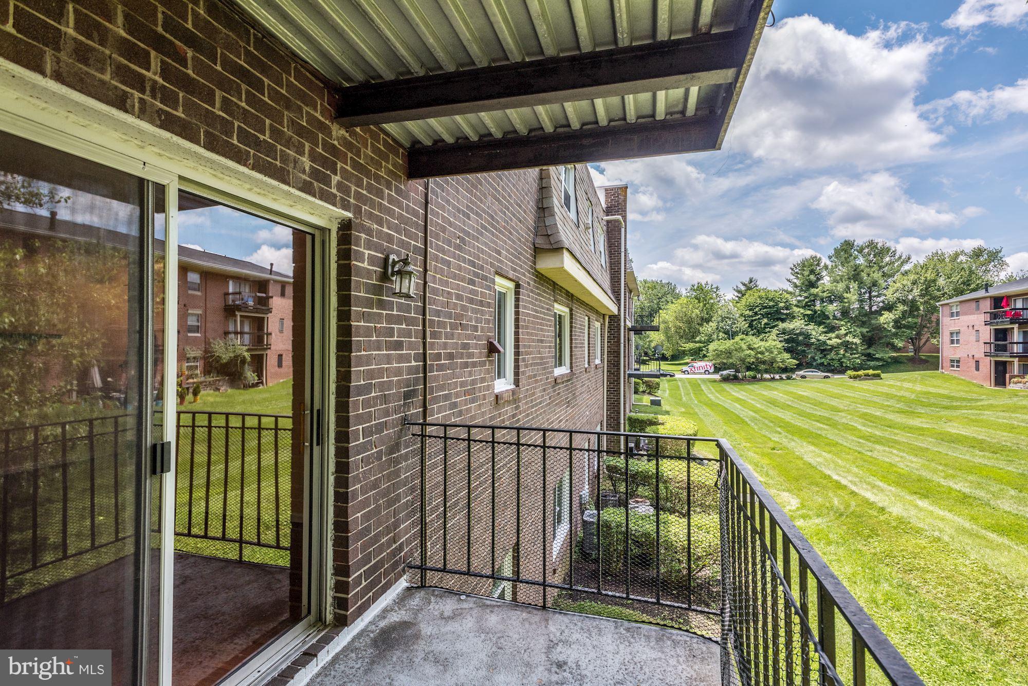 12009 Tarragon Road, Unit F Reisterstown, MD 21136 - Photo 22 of 22 a view of a house with a street