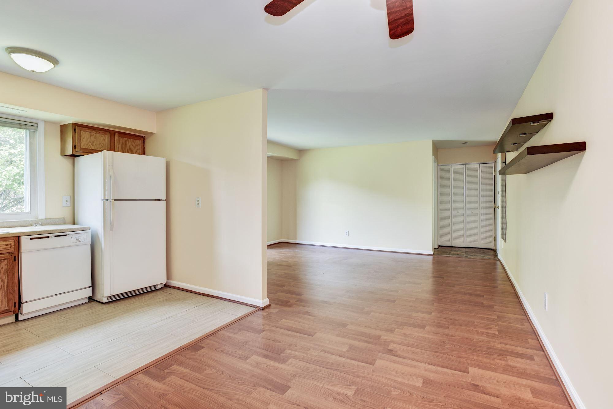 12009 Tarragon Road, Unit F Reisterstown, MD 21136 - Photo 6 of 22 wooden floor in an empty room