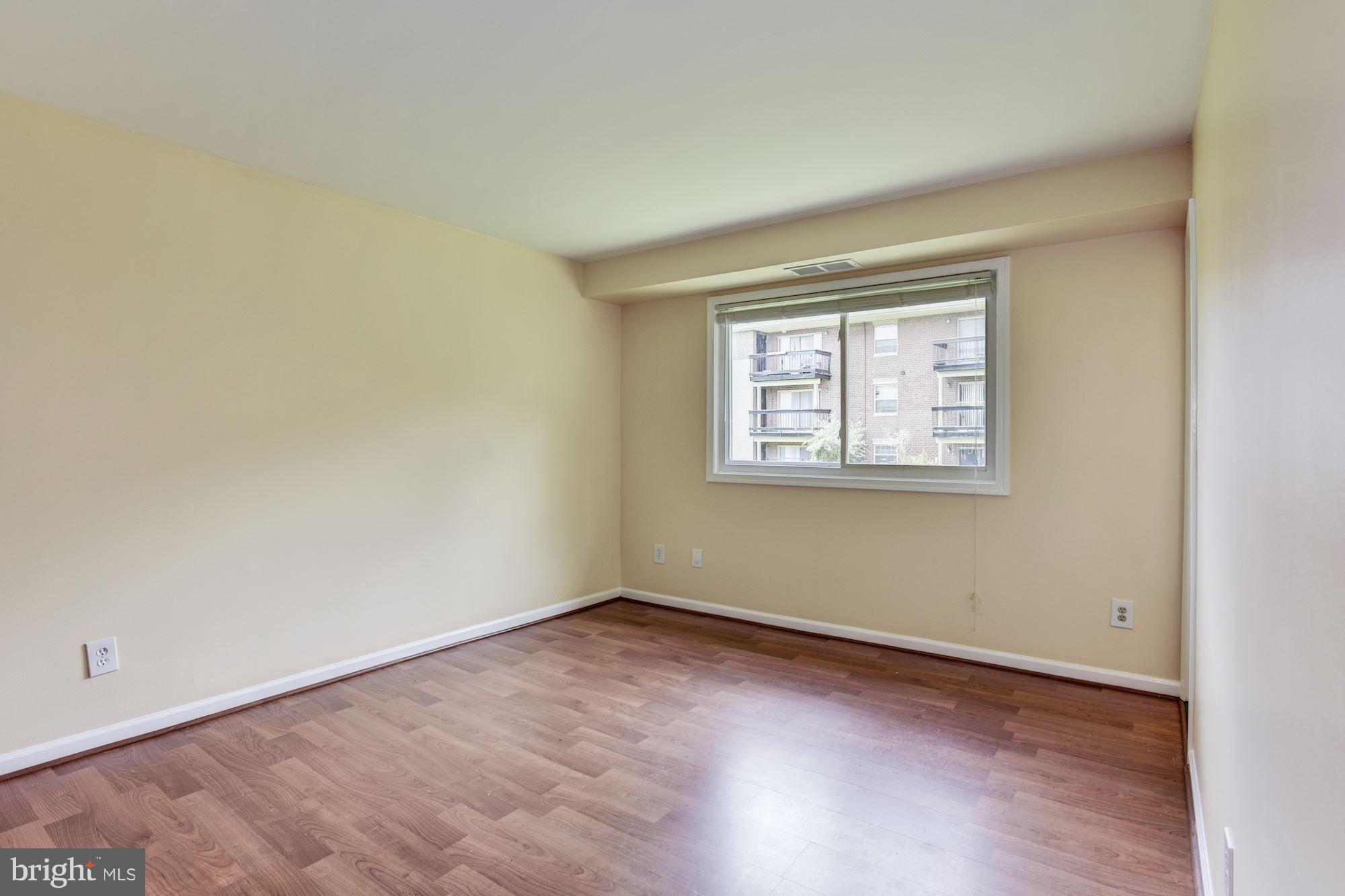 12009 Tarragon Road, Unit F Reisterstown, MD 21136 - Photo 10 of 22 an empty room with a window
