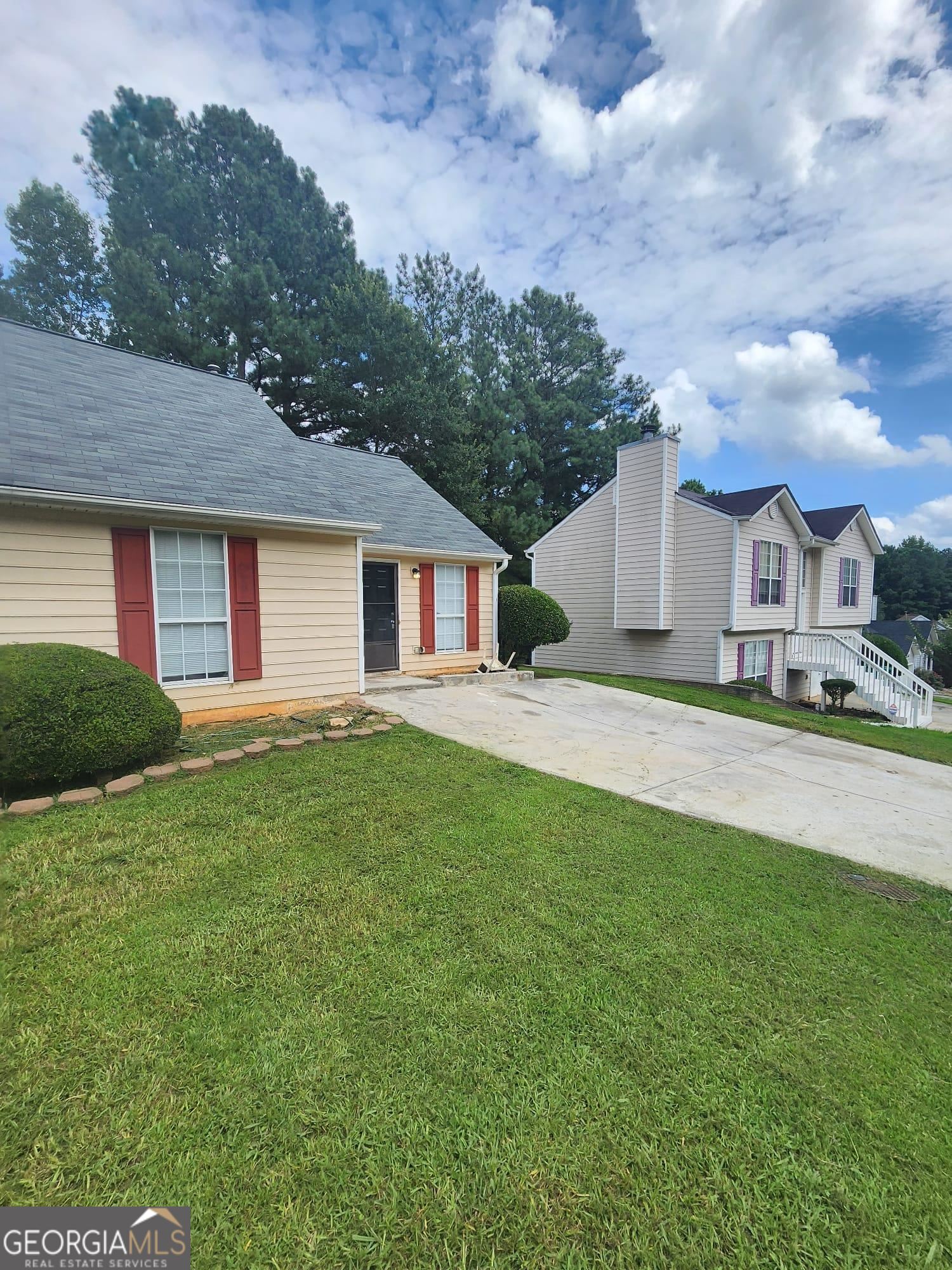 3789 Conley Downs Drive Decatur, GA 30034 - Photo 1 of 1 a front view of a house with a garden