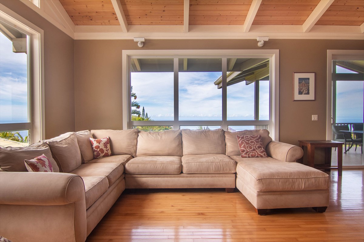 82-1135 Kinue Road Captain Cook, HI 96704 - Photo 11 of 30 a living room with furniture and a large window