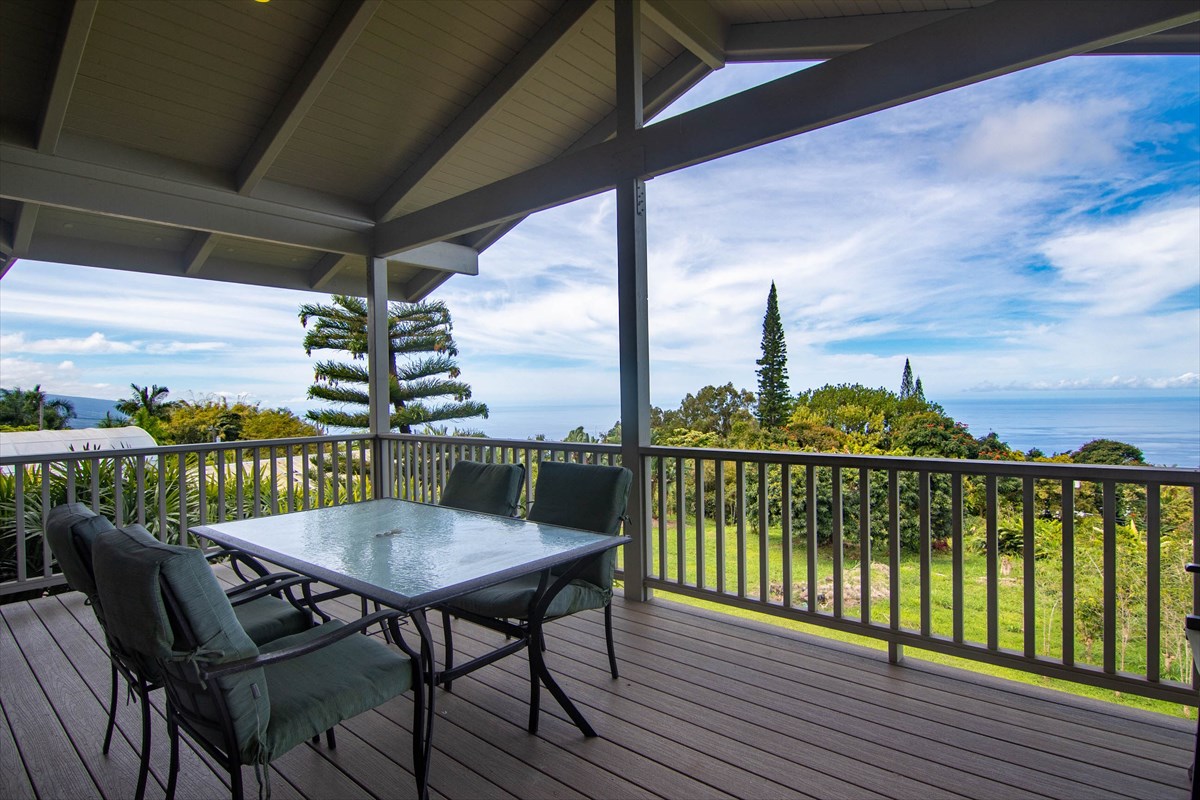 82-1135 Kinue Road Captain Cook, HI 96704 - Photo 4 of 30 a view of a balcony with wooden floor