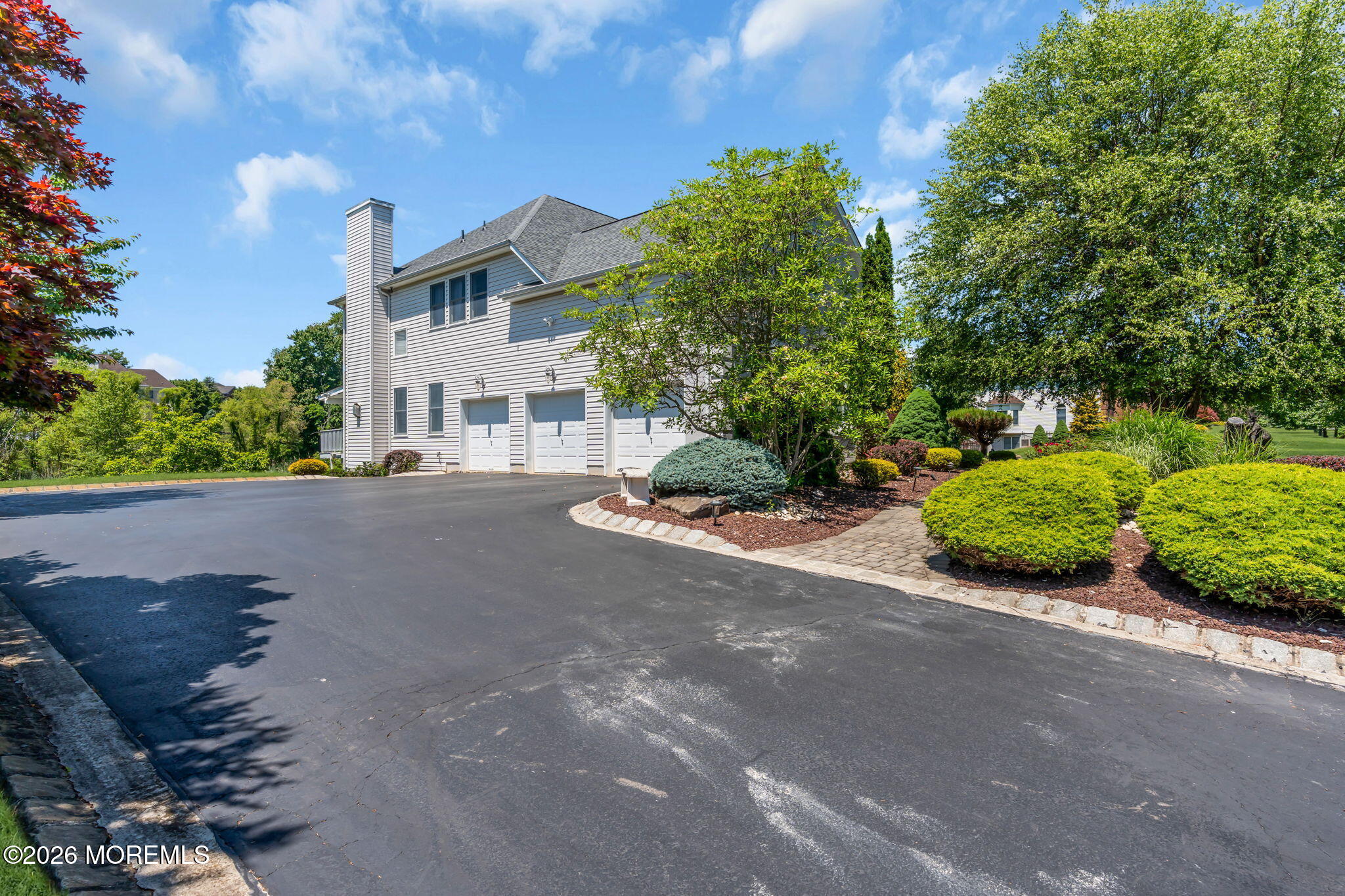 14 Diamond Hill Road Marlboro, NJ 07746 - Photo 74 of 79 a view of a street with a house