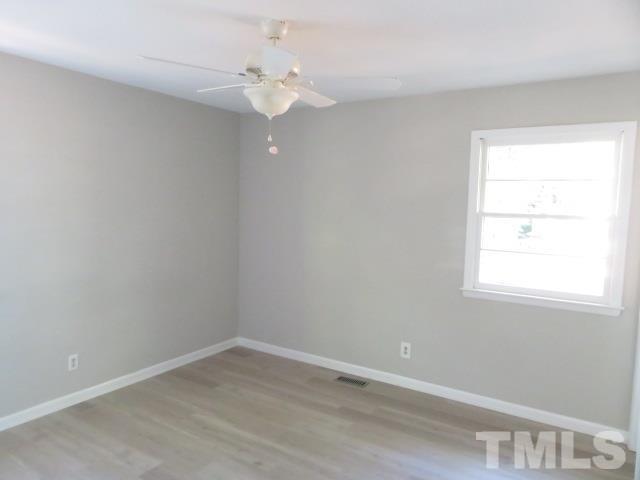 1700 Woodland Road Garner, NC 27529 - Photo 14 of 21 an empty room with a window