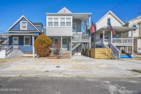a front view of house with a yard
