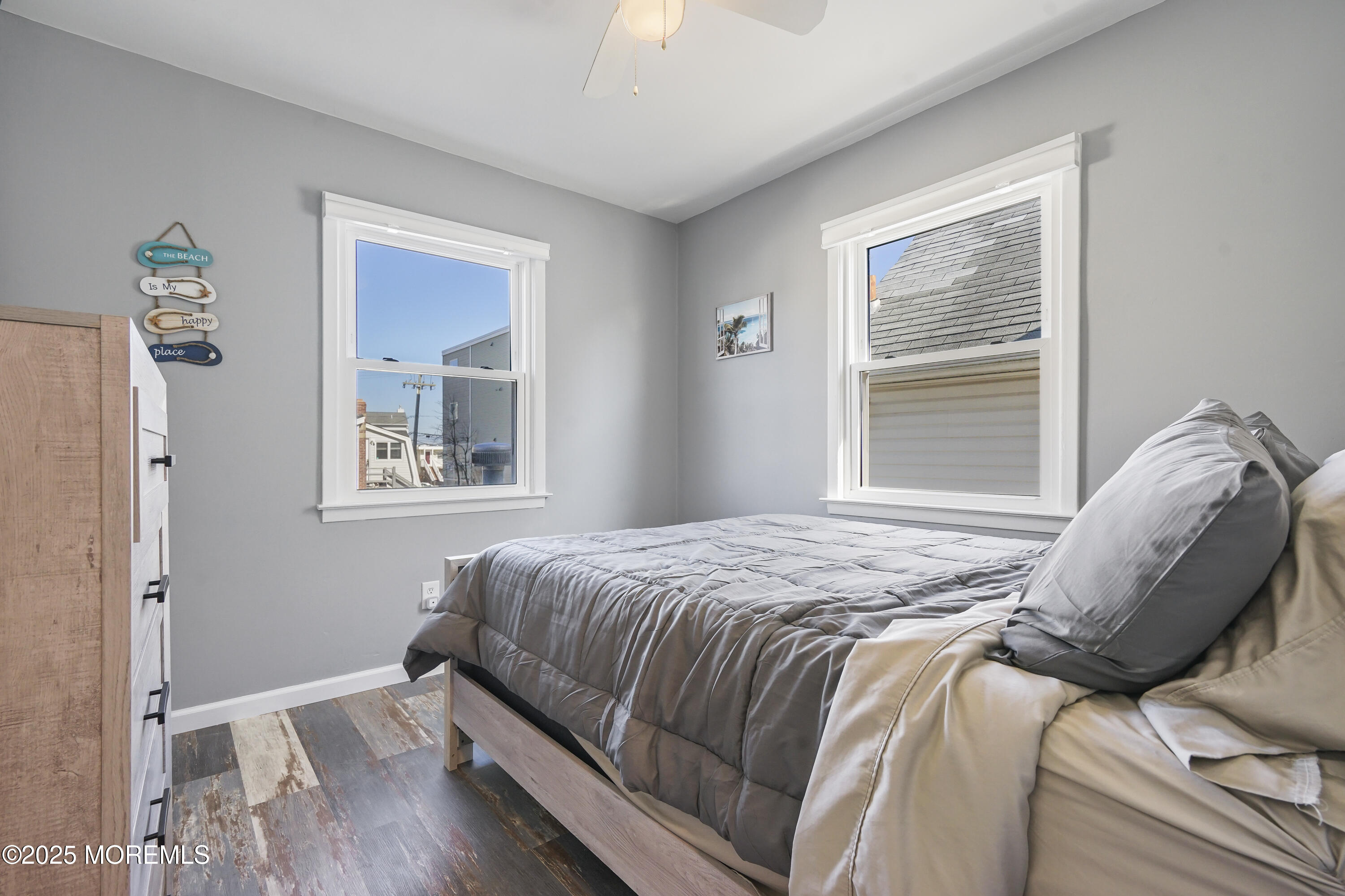 214 Webster Avenue, Unit 2 Seaside Heights, NJ 08751 - Photo 10 of 14 a bedroom with a bed and a window