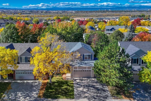 a view of a city with a building in the background