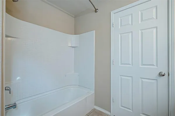 a bathroom with a bathtub